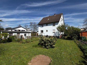 Hauptbild **VERMIETET** Kinderlachen im Grünen - 3-Zimmer-Wohnung mit Sonnenterrasse und direktem Gartenzugang