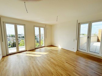 Hauptbild **VERMIETET** Helligkeit & Eichenholz: Barrierefreie 3-Zimmer-Wohnung mit Dachterrasse & Fernblick